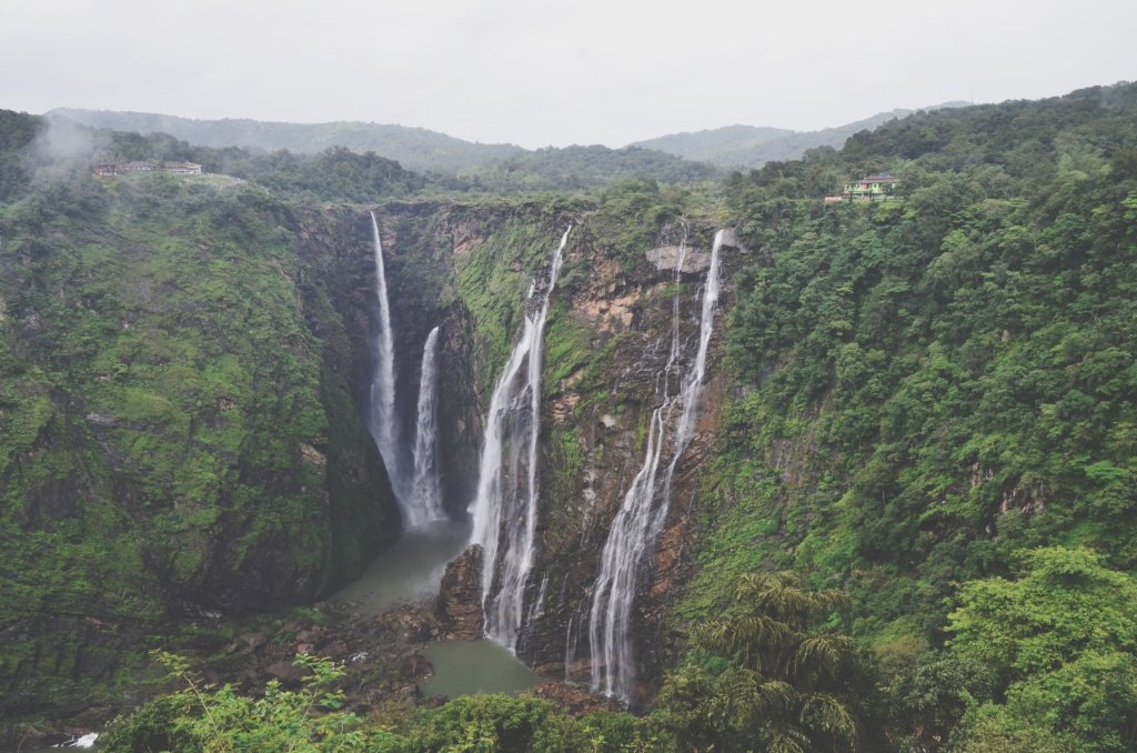 scenic-view-waterfall-against-sky